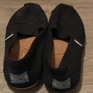TOMS Black and Cream Casual Slip-Ons